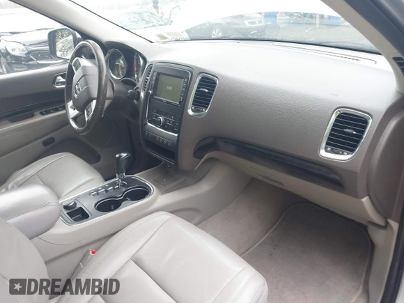 2013 Dodge Durango Crew with VIN 1C4SDJDT8DC565608, listed as a IAAI auction lot 42181773 with 161,485 mi miles and . Bid and sale history available at DreamBid. Image 5.