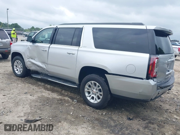 2019 GMC Yukon XL SLT z VIN 1GKS1GKC0KR242408, wystawiony jako IAAI lot #42144783 z przebiegiem Nie podano mil oraz . Historia ofert i sprzedaży dostępna na DreamBid. Obrazek 3.