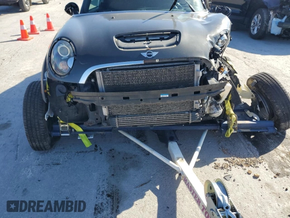 2012 MINI Convertible S with VIN WMWZP3C58CT296381, listed as a Copart auction lot 50834655 with 111,228 mi miles and Salvage Title. Bid and sale history available at DreamBid. Image 12.