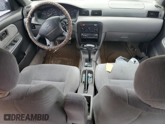 1996 Nissan Sentra XE z VIN 1N4AB41D2TC767557, wystawiony jako Copart lot #42553245 z przebiegiem 148 514 mil mil oraz Szkoda całkowita • Salvage title. Historia ofert i sprzedaży dostępna na DreamBid. Obrazek 8.