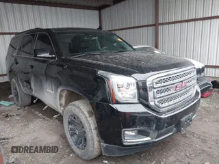 2017 GMC Yukon SLT with VIN 1GKS2BKC6HR171918, listed as a IAAI auction lot 41553393 with 106,766 mi miles. Bid and sale history available at carsss.com. Image 1.