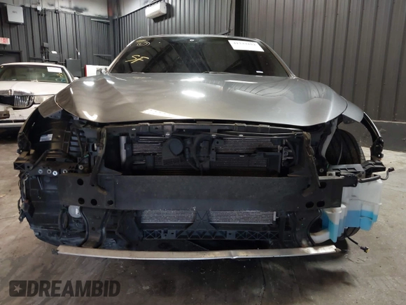 2018 Infiniti Q50 3.0t LUXE with VIN JN1EV7AR8JM610044, listed as a IAAI auction lot 41733252 with 116,320 mi miles. Bid and sale history available at carsss.com. Image 6.