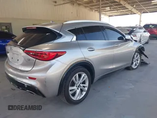 2018 Infiniti QX30 Pure with VIN SJKCH5CPXJA002505, listed as a IAAI auction lot 42276620 with 90,555 mi miles and . Bid and sale history available at DreamBid. Image 4.