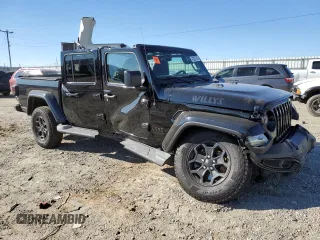 2022 Jeep Gladiator Willys с VIN 1C6JJTAM7NL179932, выставлен на аукционе Copart как лот 42287785 с пробегом 30 211 миль миль и Списание • Salvage title. История ставок и продаж доступна на DreamBid. Изображение 4.