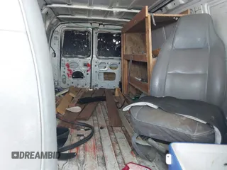 1998 Ford Econoline Cargo with VIN 1FTNS2421WHC08759, listed as a IAAI auction lot 42785005 with Not provided miles and . Bid and sale history available at DreamBid. Image 8.
