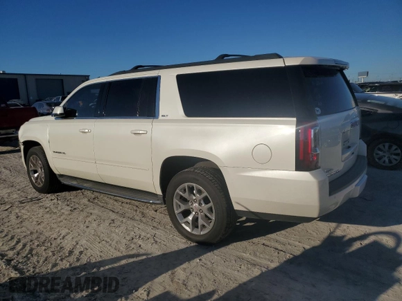 2015 GMC Yukon XL SLT with VIN 1GKS1HKC6FR166415, listed as a Copart auction lot 73029014 with 105,209 mi miles and Salvage Title. Bid and sale history available at carsss.com. Image 2.