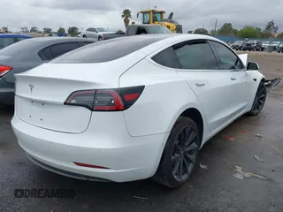 2018 Tesla Model 3 Long Range Battery with VIN 5YJ3E1EA1JF038751, listed as a IAAI auction lot 40553966 with 95,753 mi miles and . Bid and sale history available at DreamBid. Image 4.