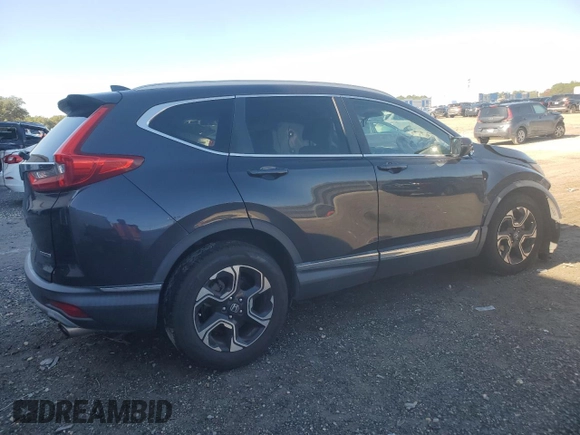2018 Honda CR-V Touring with VIN 2HKRW1H94JH507406, listed as a Copart auction lot 86980214 with 76,527 mi miles and Salvage Title. Bid and sale history available at DreamBid. Image 3.