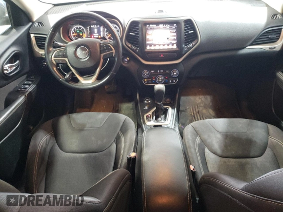 2015 Jeep Cherokee Latitude with VIN 1C4PJMCS7FW504728, listed as a Copart auction lot 81674984 with 144,342 mi miles and Salvage Title. Bid and sale history available at carsss.com. Image 8.