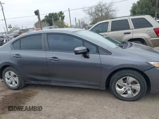 2014 Honda Civic LX z VIN 2HGFB2F53EH528803, wystawiony jako IAAI lot #41567819 z przebiegiem Nie podano mil oraz . Historia ofert i sprzedaży dostępna na DreamBid. Obrazek 13.