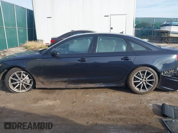2018 Audi A6 Prestige with VIN WAUH3AFC6JN035676, listed as a IAAI auction lot 40651293 with 65,642 mi miles and . Bid and sale history available at DreamBid. Image 14.