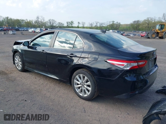 2020 Toyota Camry LE with VIN 4T1C11AK2LU393699, listed as a IAAI auction lot 42123267 with 66,932 mi miles and . Bid and sale history available at carsss.com. Image 3.