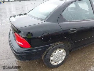 1997 Dodge Neon with VIN 1B3ES27C3VD261832, listed as a IAAI auction lot 41964028 with 220,237 mi miles. Bid and sale history available at carsss.com. Image 6.