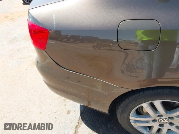 2014 Volkswagen Jetta S with VIN 3VW2K7AJ8EM319182, listed as a IAAI auction lot 42180101 with 133,495 mi miles and . Bid and sale history available at DreamBid. Image 18.