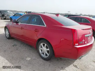 2009 Cadillac CTS RWD w/1SA with VIN 1G6DF577490135353, listed as a IAAI auction lot 41724476 with 128,062 mi miles. Bid and sale history available at carsss.com. Image 3.