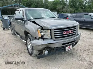 2013 GMC Sierra 1500 SLT with VIN 3GTP2WE25DG134770, listed as a Copart auction lot 59616535 with 212,304 mi miles and Salvage title. Bid and sale history available at DreamBid. Image 13.