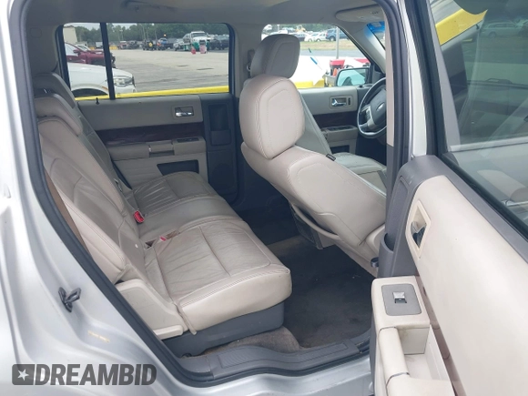 2010 Ford Flex SEL z VIN 2FMGK5CC6ABA82100, wystawiony jako IAAI lot #41960218 z przebiegiem 198 328 mil mil oraz . Historia ofert i sprzedaży dostępna na DreamBid. Obrazek 8.