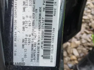 2011 Mazda 3 i Sport with VIN JM1BL1UG8B1374527, listed as a Copart auction lot 54906065 with 137,678 mi miles and Salvage Title. Bid and sale history available at DreamBid. Image 12.