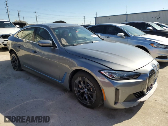 2023 BMW i4 eDrive40 with VIN WBY73AW08PFN59966, listed as a Copart auction lot 48546554 with 11,689 mi miles. Bid and sale history available at carsss.com. Image 4.
