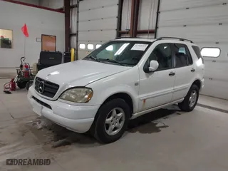 2000 Mercedes-Benz M-Class with VIN 4JGAB54E2YA166846, listed as a IAAI auction lot 41744657 with 226,711 mi miles. Bid and sale history available at carsss.com. Image 2.