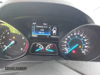 2015 Ford Escape SE with VIN 1FMCU9GX5FUB99018, listed as a IAAI auction lot 42250840 with 126,850 mi miles and . Bid and sale history available at DreamBid. Image 7.