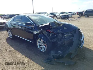 2019 Cadillac XTS Luxury z VIN 2G61M5S39K9139598, wystawiony jako IAAI lot #41775455 z przebiegiem 95 488 mil mil oraz . Historia ofert i sprzedaży dostępna na DreamBid. Obrazek 1.