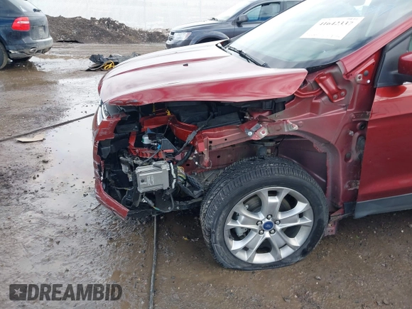 2014 Ford Escape Titanium with VIN 1FMCU9J92EUE01077, listed as a IAAI auction lot 41642337 with 26,002 mi miles. Bid and sale history available at carsss.com. Image 6.