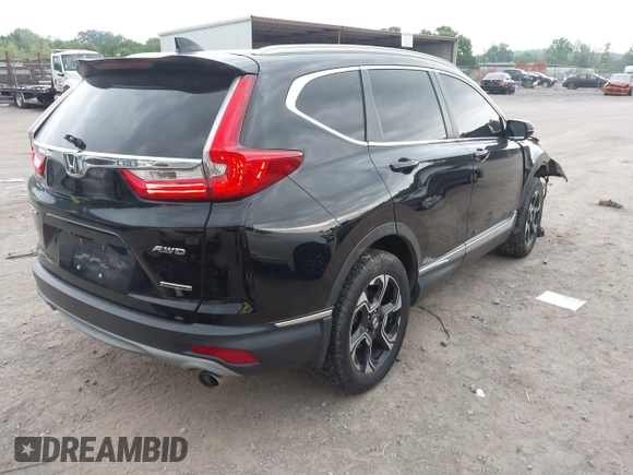 2017 Honda CR-V Touring with VIN 2HKRW2H96HH672017, listed as a IAAI auction lot 42151118 with 144,527 mi miles and . Bid and sale history available at carsss.com. Image 4.