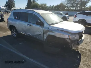 2013 Jeep Compass Sport with VIN 1C4NJCBB9DD258230, listed as a Copart auction lot 84009494 with 195,750 mi miles and Salvage Title. Bid and sale history available at carsss.com. Image 4.