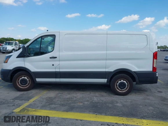 2020 Ford Transit Cargo with VIN 1FTYE1Y8XLKB80973, listed as a IAAI auction lot 41707281 with 112,721 mi miles and . Bid and sale history available at DreamBid. Image 14.