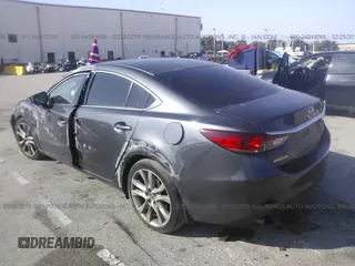 2016 Mazda Mazda6 i Touring with VIN JM1GJ1V51G1469446, listed as a IAAI auction lot 24549066 with 40,606 mi miles. Bid and sale history available at carsss.com. Image 3.