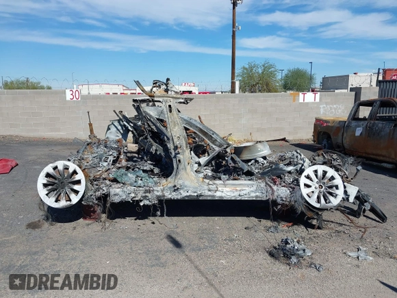 2017 Tesla Model S 100D with VIN 5YJSA1E21HF217043, listed as a IAAI auction lot 37690137 with Not Provided miles and . Bid and sale history available at DreamBid. Image 12.