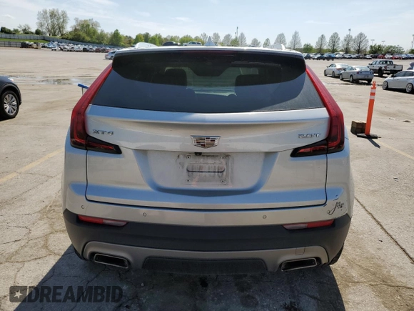 2019 Cadillac XT4 FWD Premium Luxury z VIN 1GYFZCR4XKF224734, wystawiony jako Copart lot #54141975 z przebiegiem 87 633 mil mil oraz Szkody całkowita. Historia ofert i sprzedaży dostępna na DreamBid. Obrazek 6.