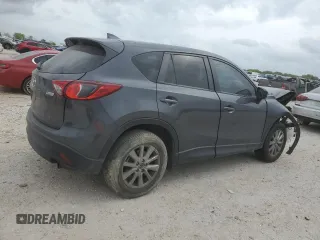 2016 Mazda CX-5 Touring with VIN JM3KE2CY9G0899787, listed as a Copart auction lot 50790365 with 31,294 mi miles and Salvage Title. Bid and sale history available at carsss.com. Image 3.