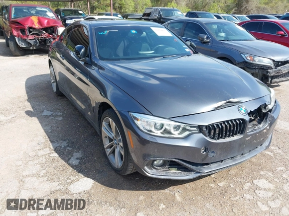 2015 BMW 4 Series 428i xDrive z VIN WBA3N5C55FK484938, wystawiony jako IAAI lot #41889907 z przebiegiem 100 439 mil mil oraz . Historia ofert i sprzedaży dostępna na DreamBid. Obrazek 1.