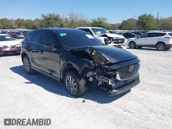 2023 Mazda CX-5 2.5 S with VIN JM3KFBAM3P0244974, listed as a IAAI auction lot 41748896 with 21,387 mi miles. Bid and sale history available at carsss.com. Image 1.