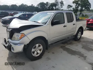 2010 Nissan Frontier SE with VIN 1N6AD0EVXAC423033, listed as a Copart auction lot 57248035 with 120,929 mi miles and Salvage title. Bid and sale history available at DreamBid. Image 1.