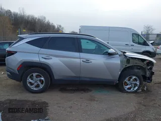 2022 Hyundai Tucson SEL z VIN 5NMJBCAE3NH070531, wystawiony jako IAAI lot #41222494 z przebiegiem 91 358 mil mil oraz . Historia ofert i sprzedaży dostępna na DreamBid. Obrazek 13.