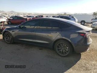 2023 Tesla Model 3 with VIN 5YJ3E1EA0PF465296, listed as a Copart auction lot 75868934 with 26,545 mi miles and Salvage Title. Bid and sale history available at DreamBid. Image 2.