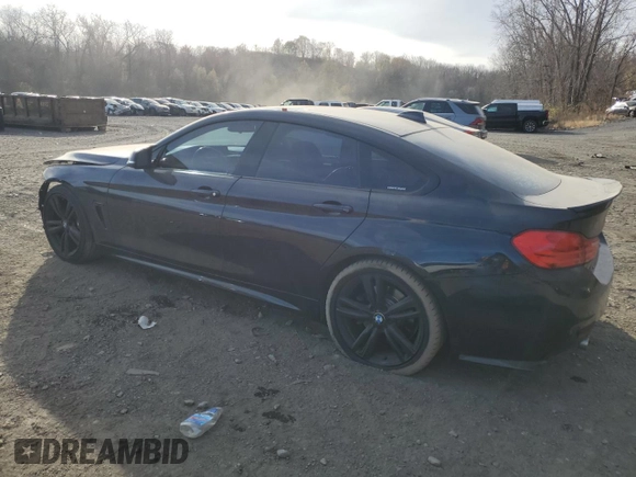 2015 BMW 4 Series 435i with VIN WBA4B1C5XFD955296, listed as a Copart auction lot 79456744 with 98,285 mi miles and Salvage Title. Bid and sale history available at DreamBid. Image 2.