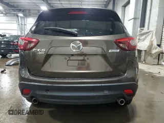 2016 Mazda CX-5 Grand Touring with VIN JM3KE4DY4G0600877, listed as a Copart auction lot 85560194 with 82,395 mi miles and Salvage Title. Bid and sale history available at carsss.com. Image 6.