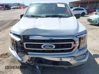 2021 Ford F-150 XL z VIN 1FTFW1E86MKD90402, wystawiony jako IAAI lot #42007680 z przebiegiem 103 724 mil mil oraz . Historia ofert i sprzedaży dostępna na DreamBid. Obrazek 12.
