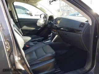 2014 Mazda CX-5 Grand Touring with VIN JM3KE2DY7E0405115, listed as a IAAI auction lot 41939899 with 147,452 mi miles. Bid and sale history available at carsss.com. Image 5.