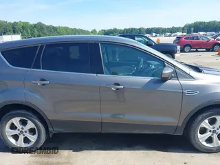 2013 Ford Escape SE with VIN 1FMCU0G92DUD71645, listed as a IAAI auction lot 42638354 with 112,128 mi miles and . Bid and sale history available at DreamBid. Image 13.