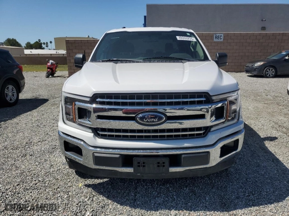 2018 Ford F-150 XL with VIN 1FTEW1CG9JKC34890, listed as a Copart auction lot 49333255 with 154,536 mi miles and Salvage Title. Bid and sale history available at carsss.com. Image 5.