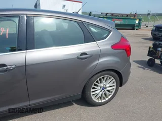 2014 Ford Focus Titanium with VIN 1FADP3N26EL453107, listed as a IAAI auction lot 42745891 with 148,743 mi miles and . Bid and sale history available at DreamBid. Image 6.