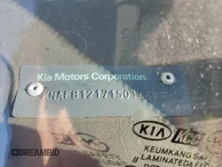 2001 Kia Sephia z VIN KNAFB121715014673, wystawiony jako Copart lot #71712174 z przebiegiem 83 277 mil mil oraz Szkody całkowita. Historia ofert i sprzedaży dostępna na DreamBid. Obrazek 12.