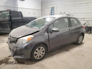 2014 Toyota Yaris L with VIN JTDJTUD35ED579476, listed as a Copart auction lot 88324415 with 76,986 mi miles and Salvage Title. Bid and sale history available at carsss.com. Image 1.