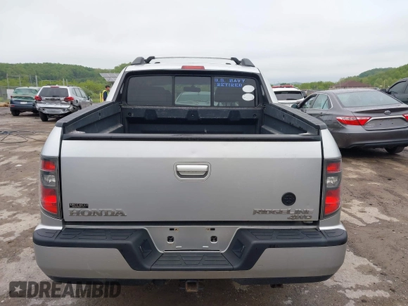 2012 Honda Ridgeline RTL with VIN 5FPYK1F58CB454385, listed as a IAAI auction lot 42212805 with 207,874 mi miles and . Bid and sale history available at DreamBid. Image 16.