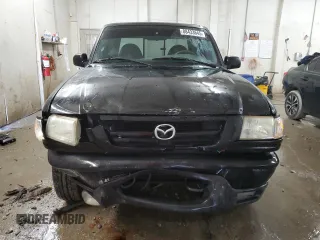 2001 Mazda B-Series 2WD Truck DS with VIN 4F4YR16V41TM25326, listed as a Copart auction lot 88433645 with 207,857 mi miles and Salvage Title. Bid and sale history available at carsss.com. Image 5.